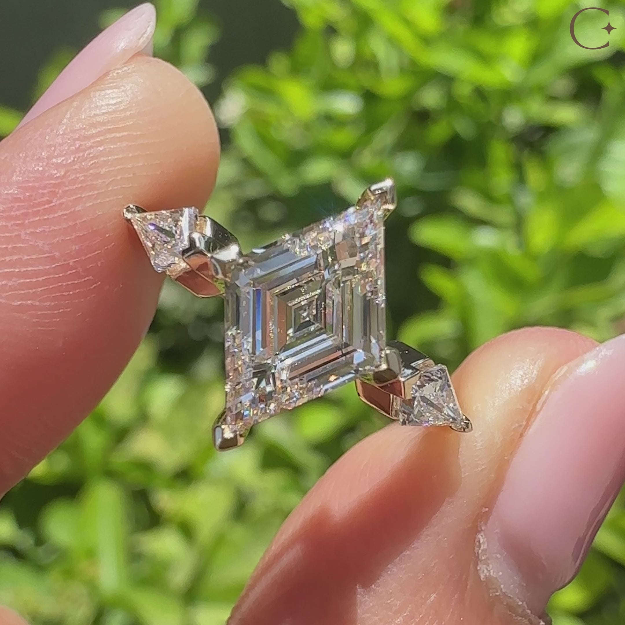 Lozenge engagement ring with lab grown diamond center stone
