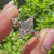 Lozenge engagement ring with lab grown diamond center stone
