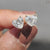 Stud earrings crafted with Heart shaped Earrings using moissanite stud earrings for secure fit.
