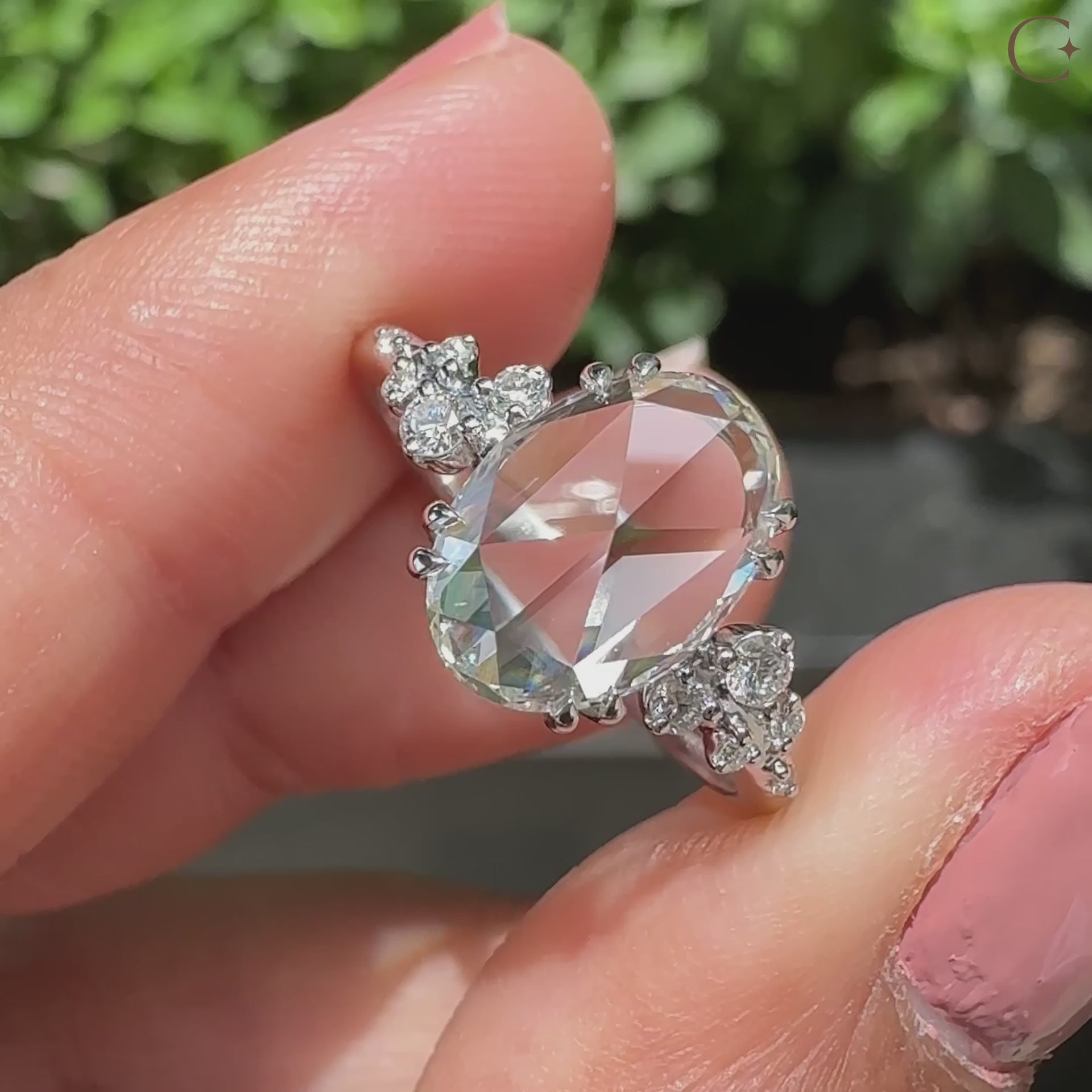 Double claw prong setting with white gold diamond ring.