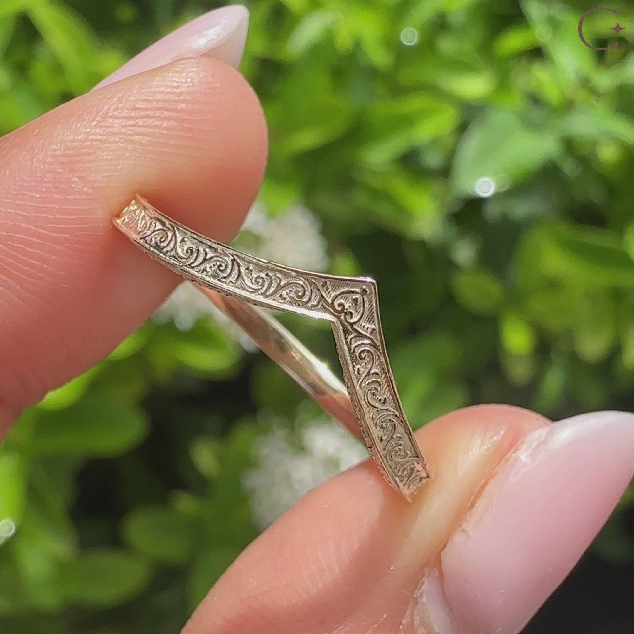 Marquise engagement ring with tulip mount and curved band
