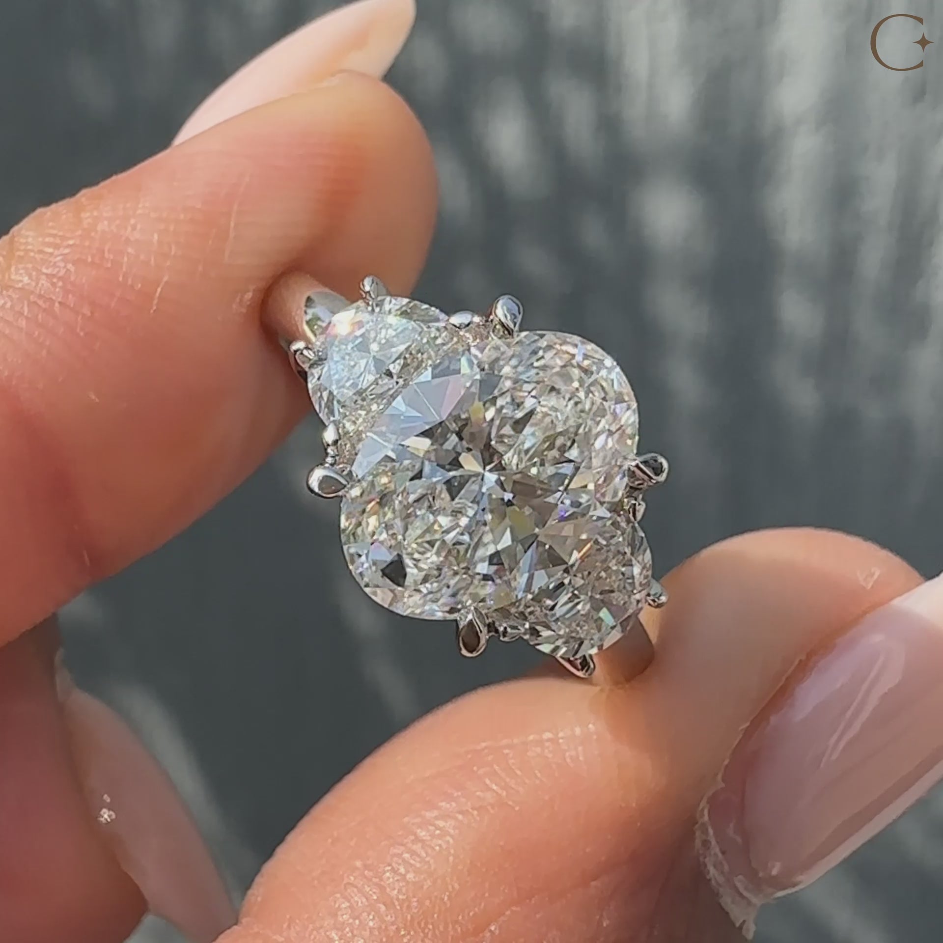 Oval Cut Diamond Engagement Ring With Half Moon Side Stone