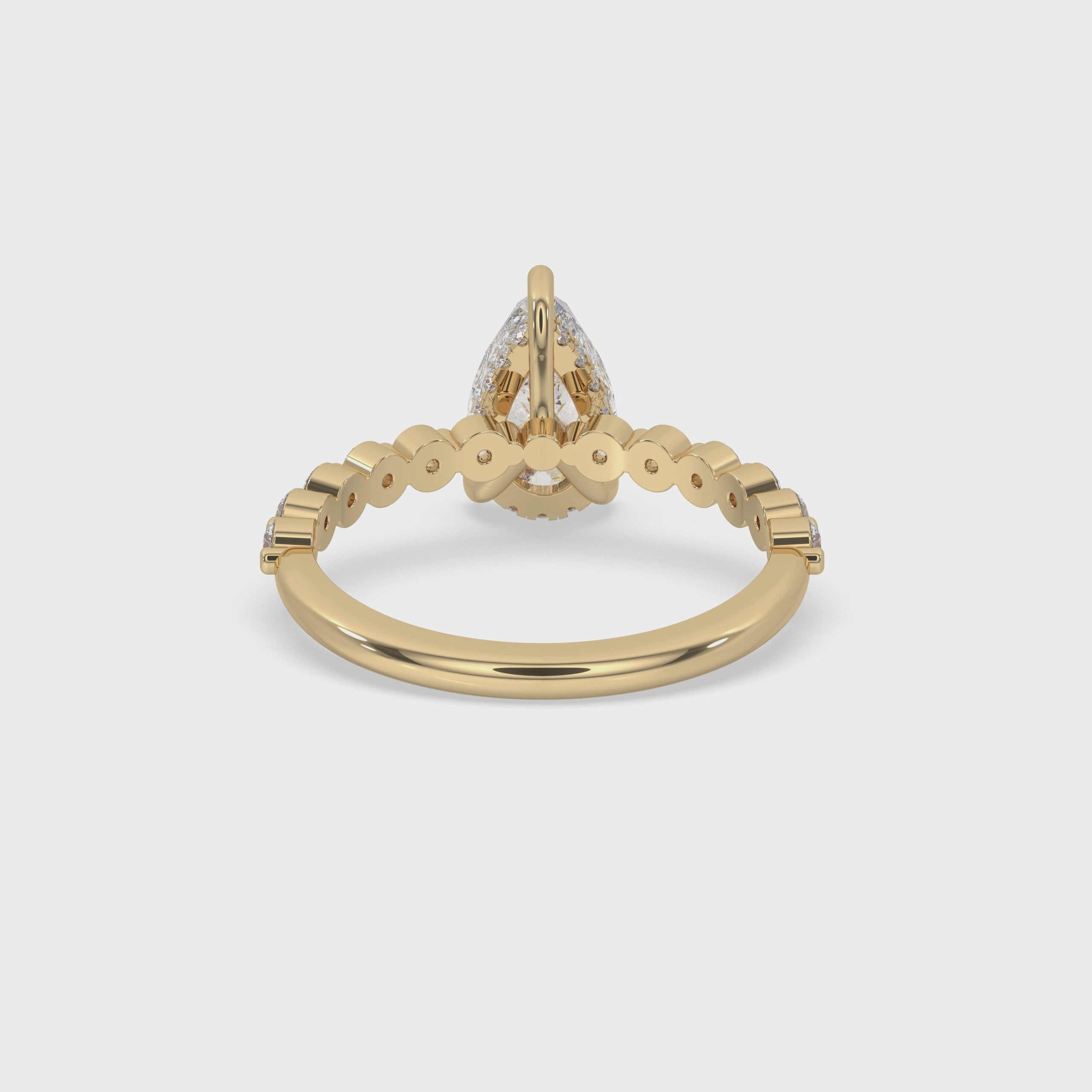 Beautiful Pear Shaped Engagement Ring in Yellow Gold Setting