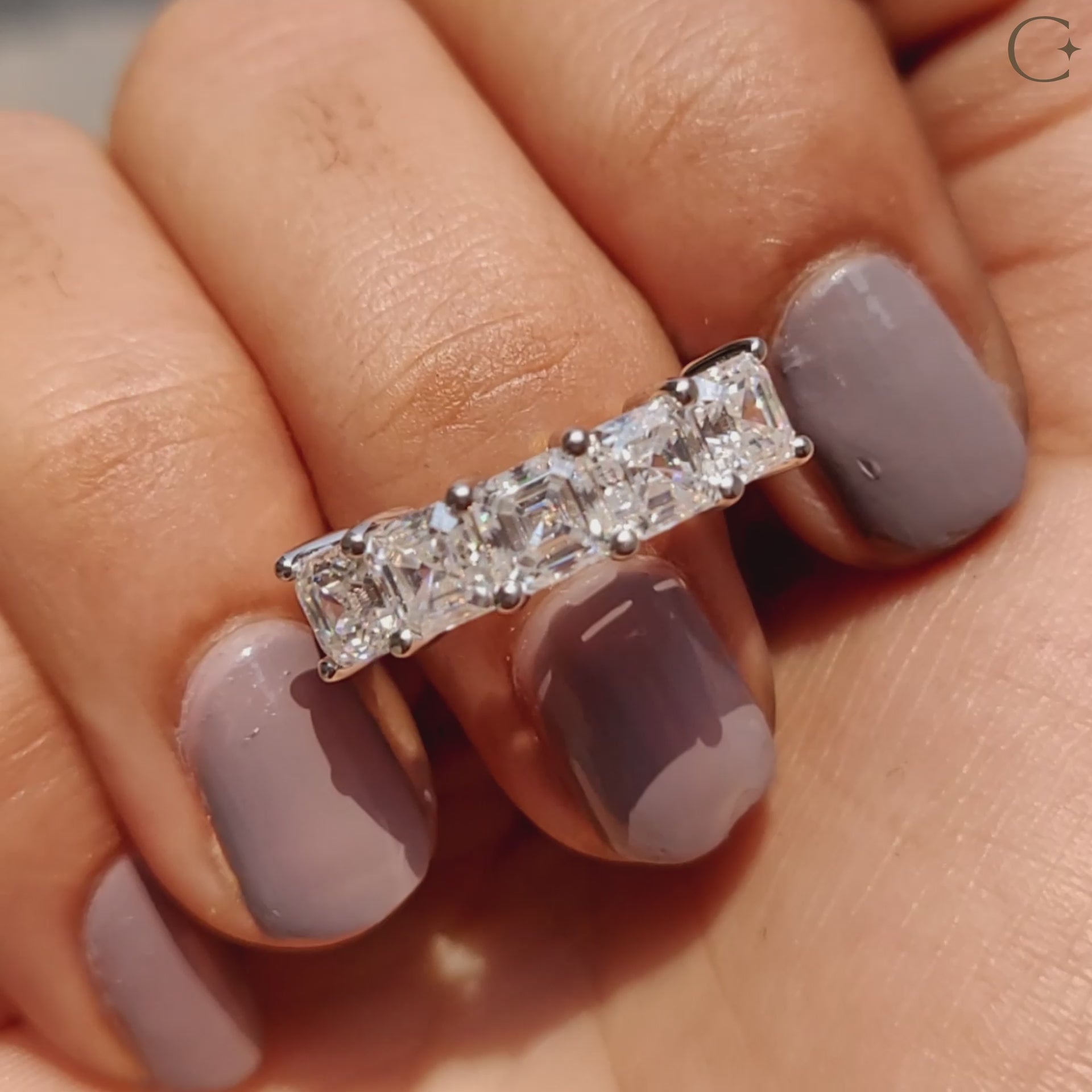 Asscher cut wedding band offers bold, square-shaped stones.
