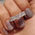 Asscher cut wedding band offers bold, square-shaped stones.