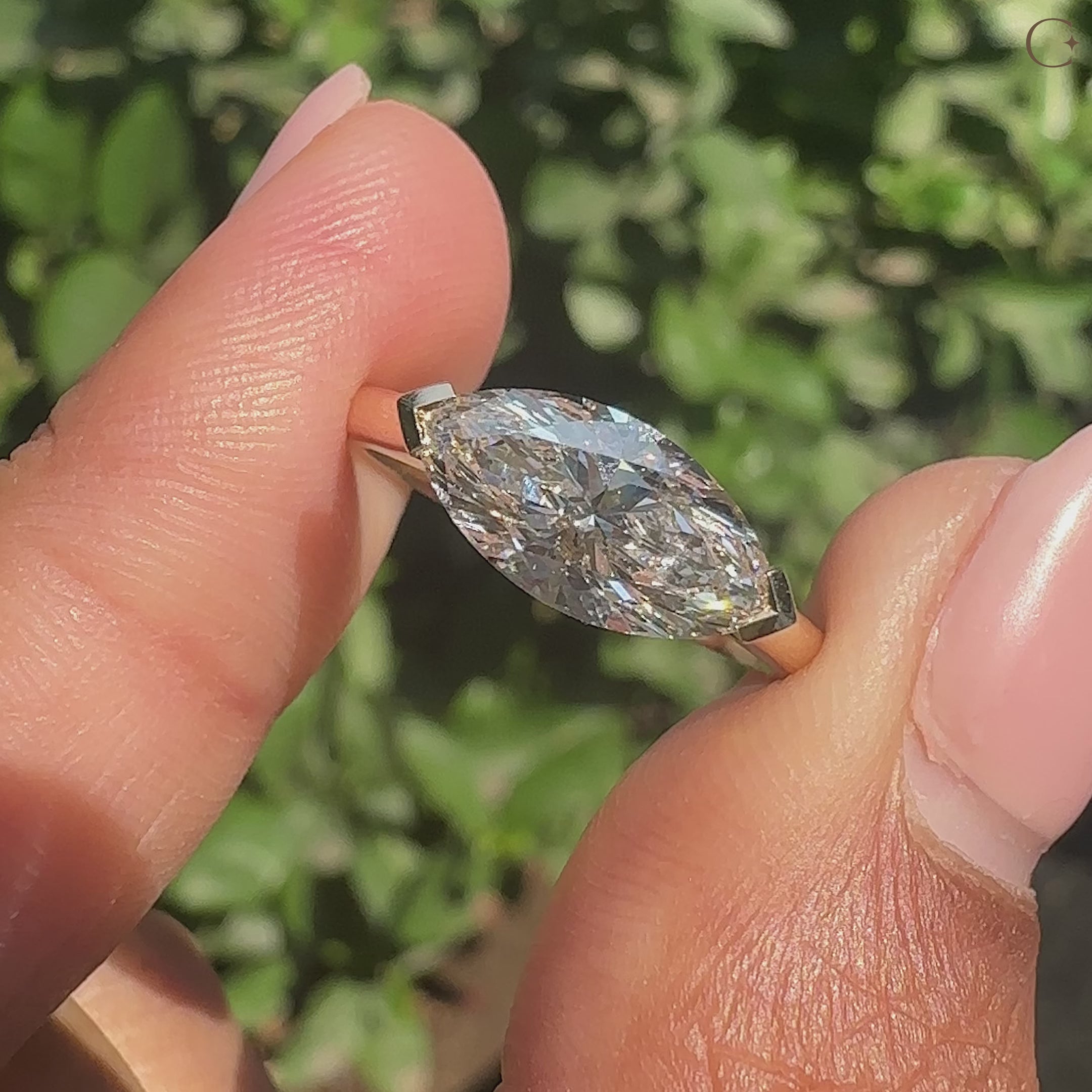 Solitaire engagement ring with marquise diamond
