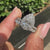 Round cut halo setting pear diamond ring