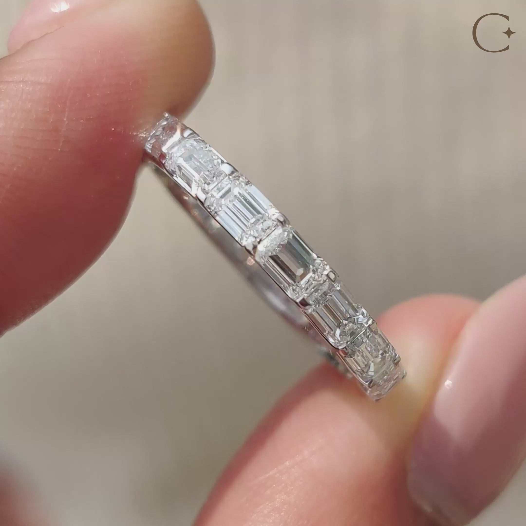 Diamond eternity band featuring brilliance and classic beauty.

