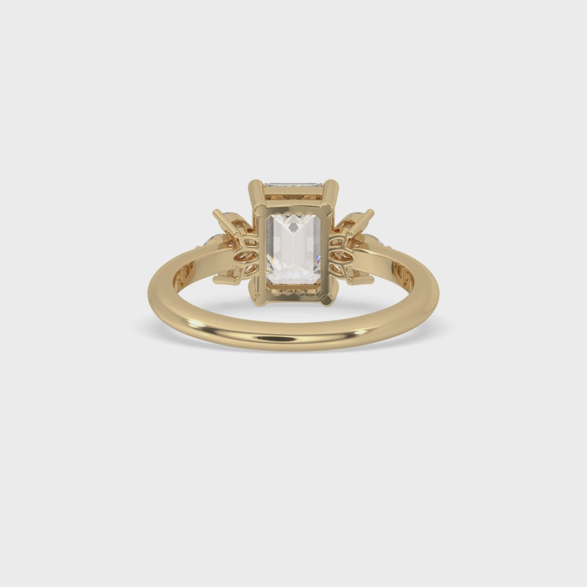Emerald Cut Diamond Ring With Marquise Side Stones