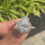 Pear Shaped Halo Engagement Ring In Round Cut Halo Style