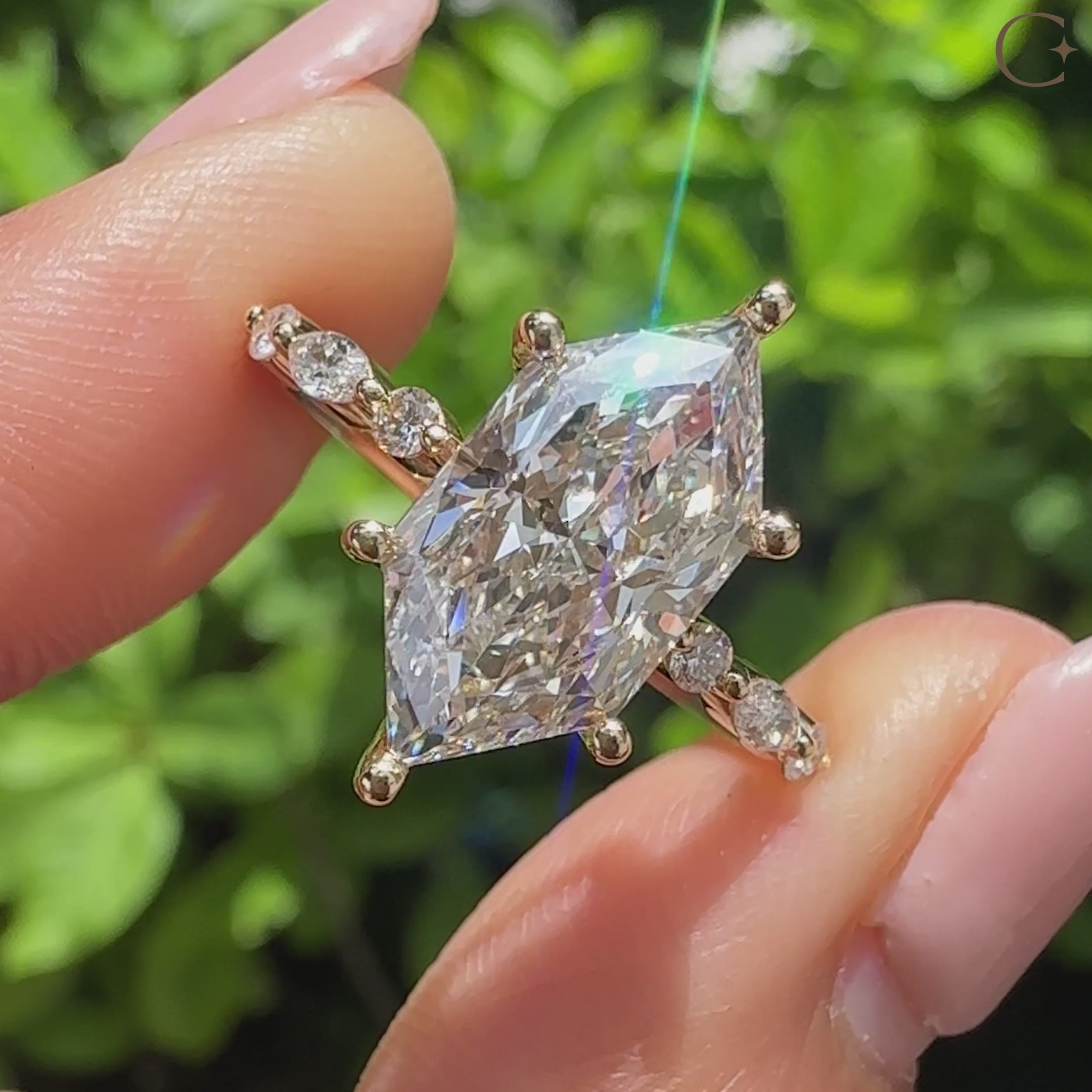 Lab grown marquise engagement ring with distance pave details
