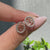 Handmade Cancer stud earrings featuring halo diamond design.
