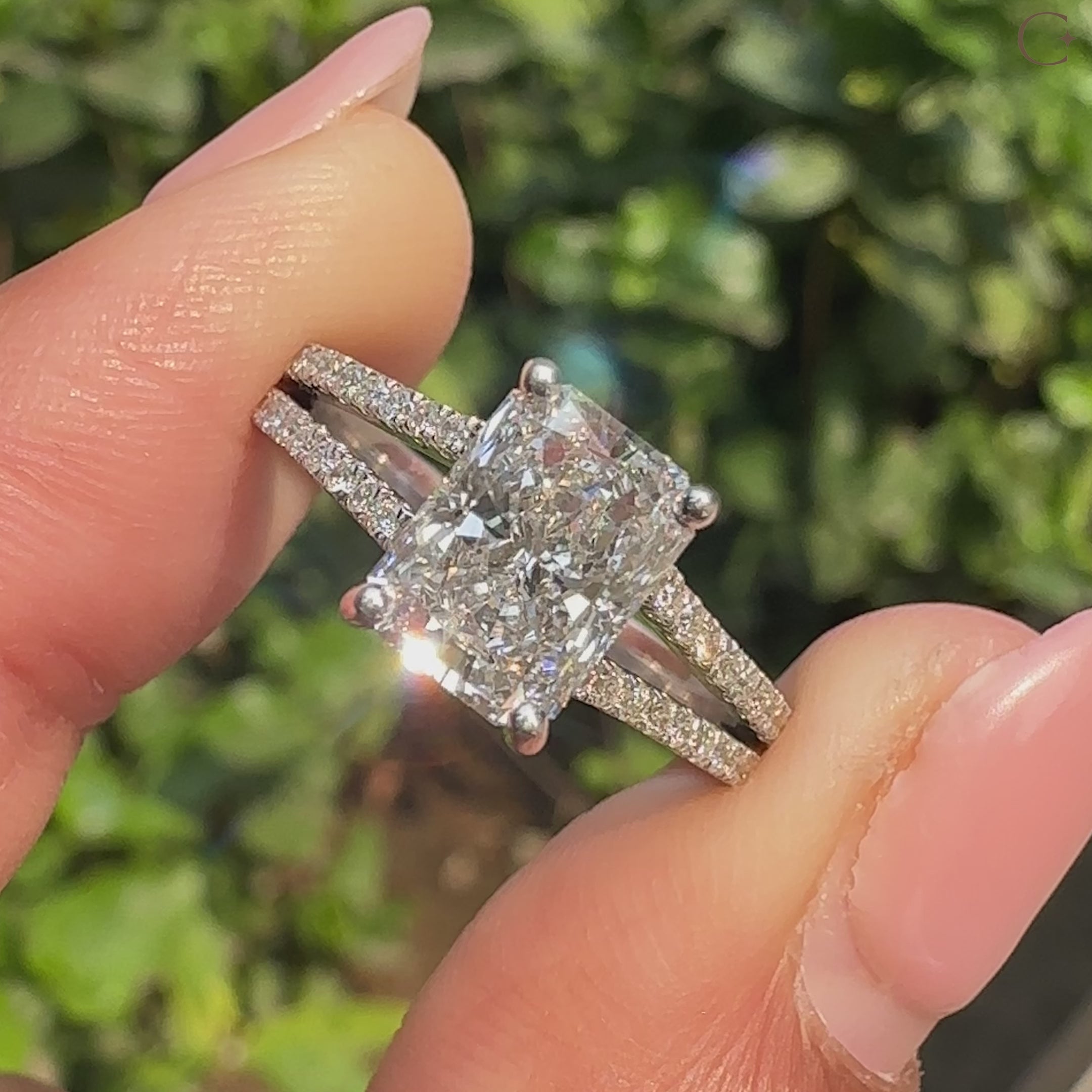 Radiant cut diamond engagement ring with hidden halo.
