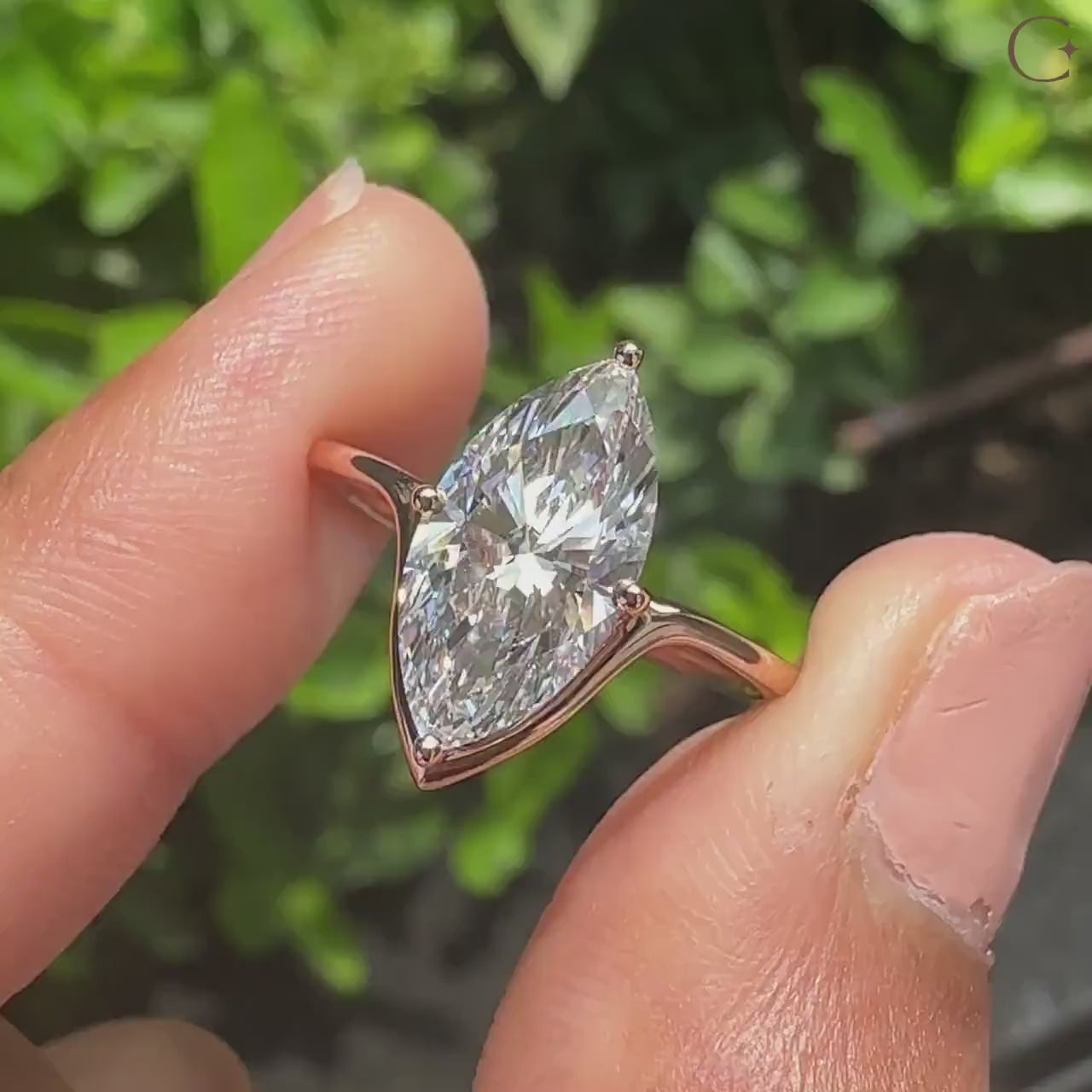 Solitaire engagement ring with half bezel setting.
