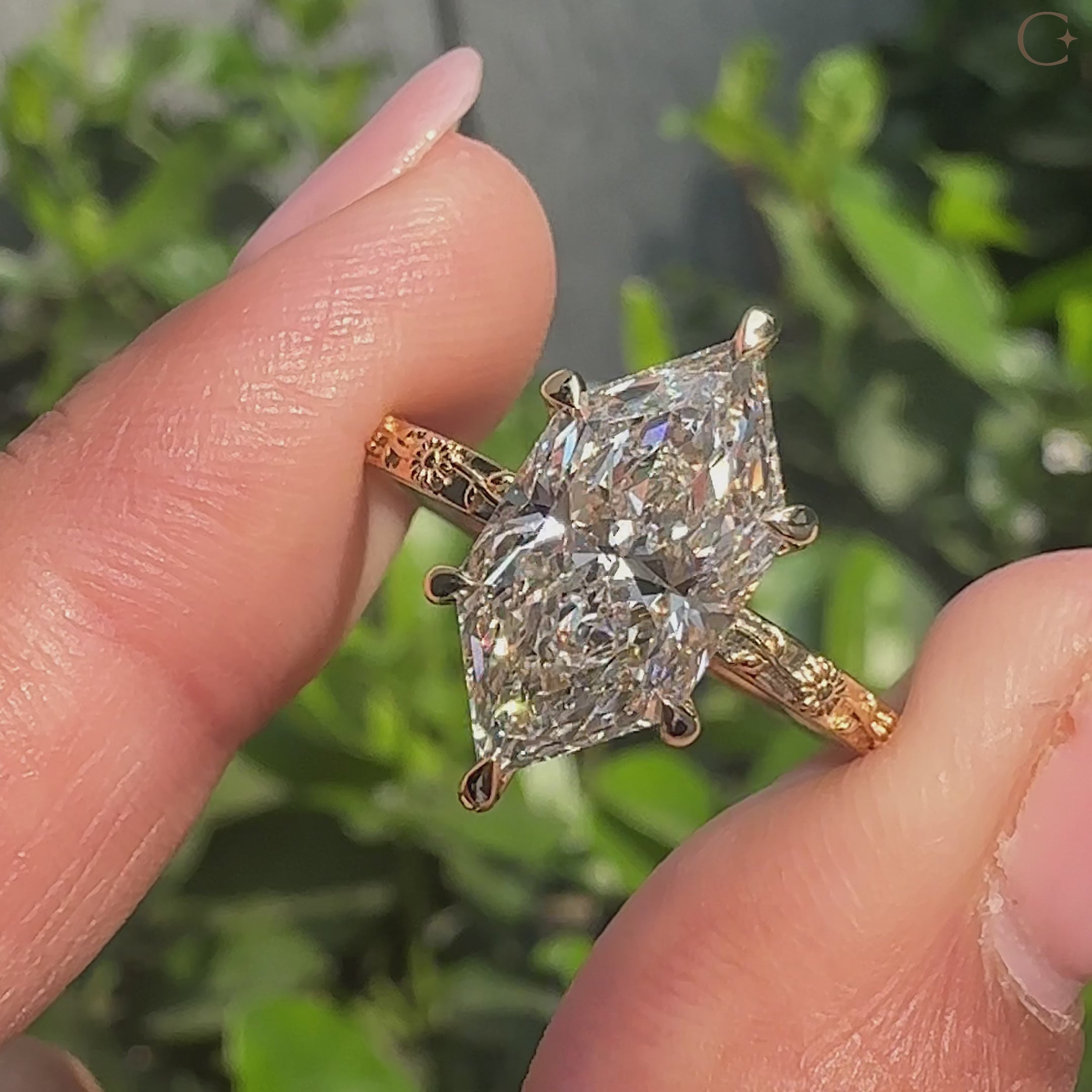 Nature inspired Dutch marquise engagement ring with sunflower design