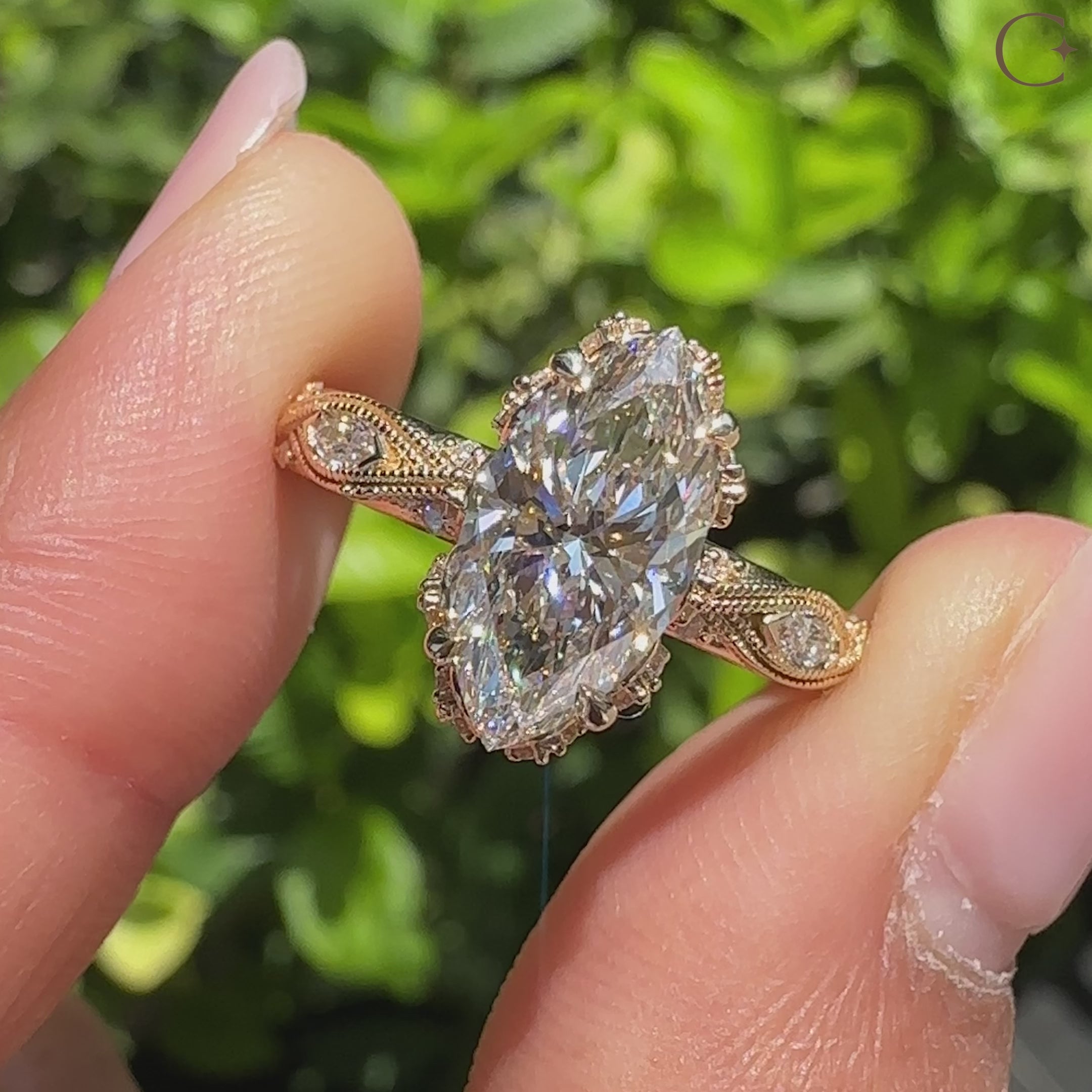 Vintage marquise diamond ring with round side stones.

