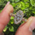 Vintage marquise diamond ring with round side stones.
