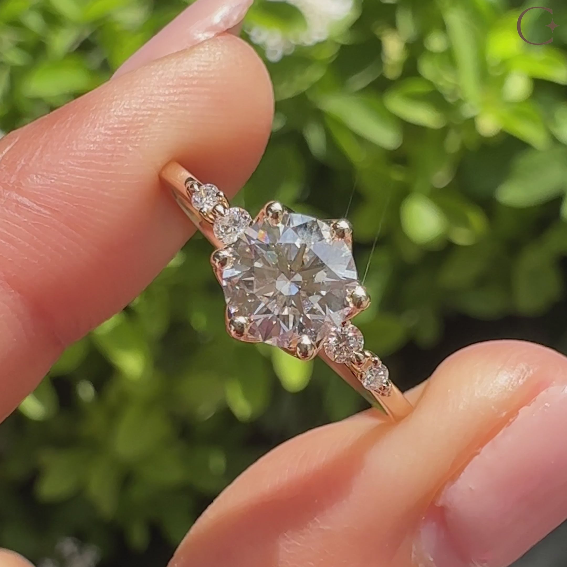 Five stone round diamond ring with tulip setting details
