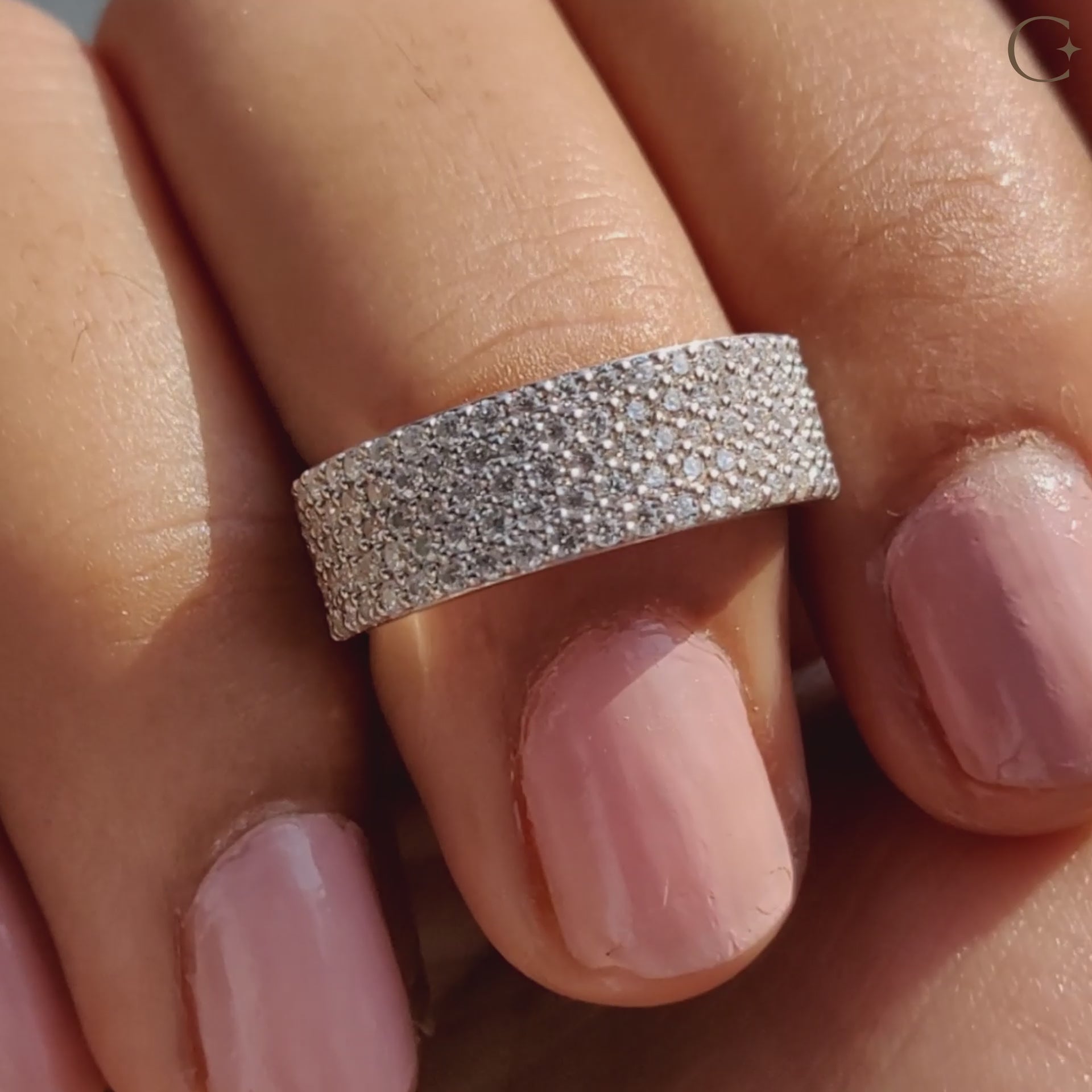 Round cut moissanite band designed for timeless brilliance in a modern setting.
