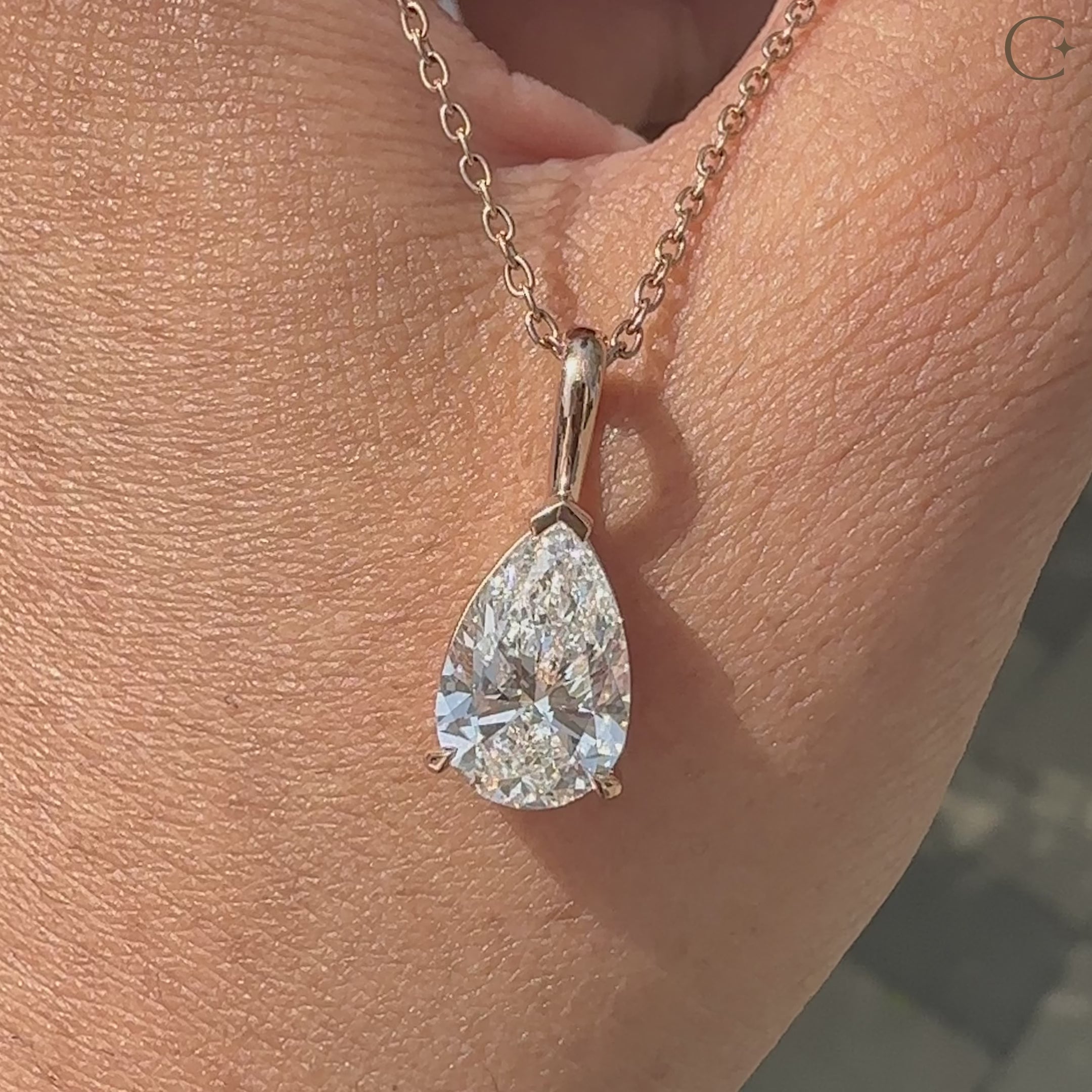 Claw prong in solitaire diamond pendant.
