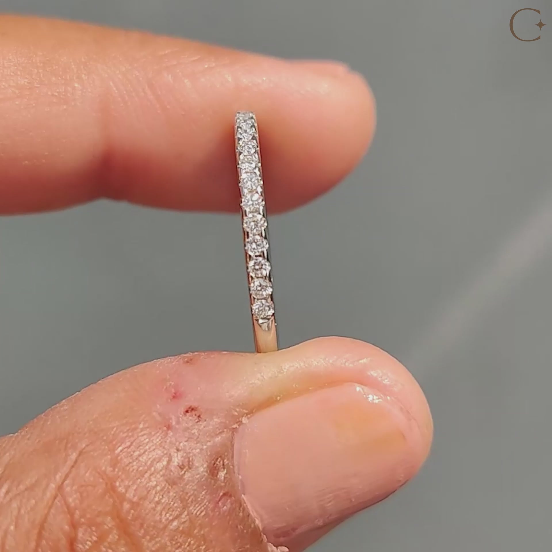Elegant half eternity wedding band in white gold.
