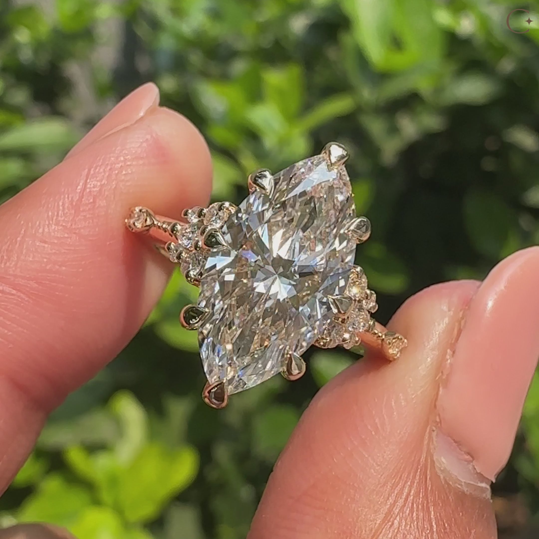 Vintage style marquise engagement ring with milgrain detailing
