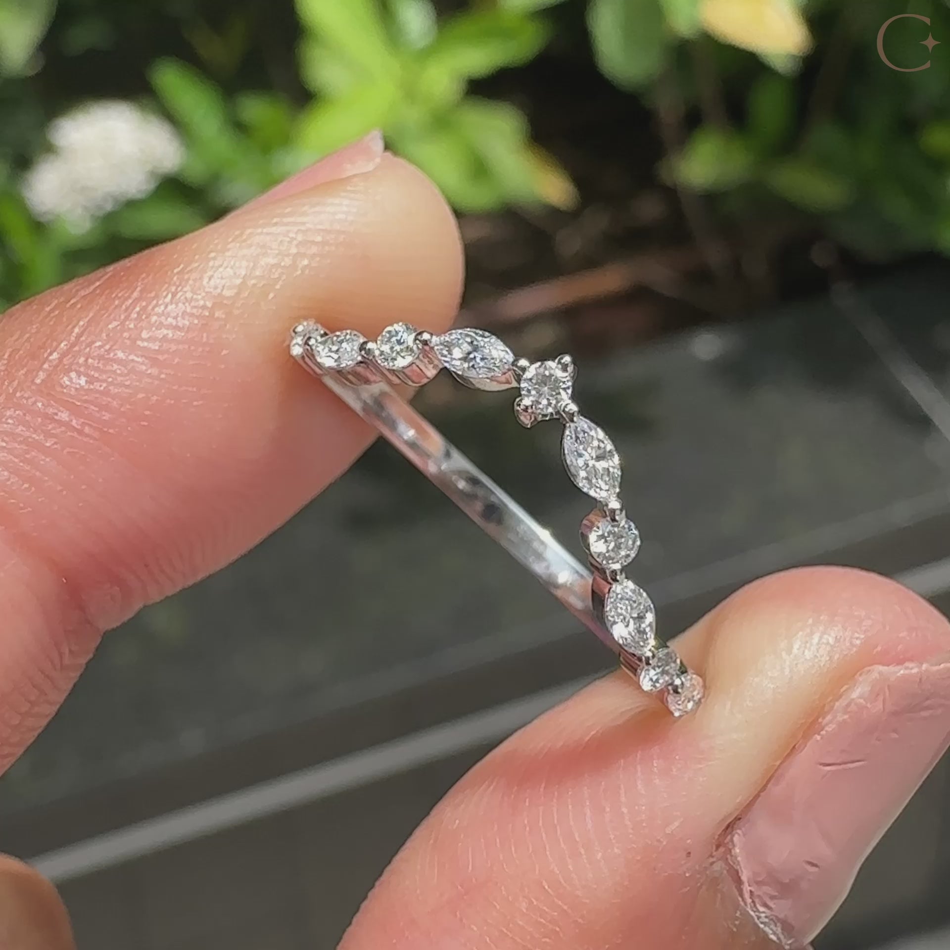 U shaped wedding band with curvy wedding band.

