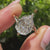 Solitaire engagement ring with pear step cut diamond.
