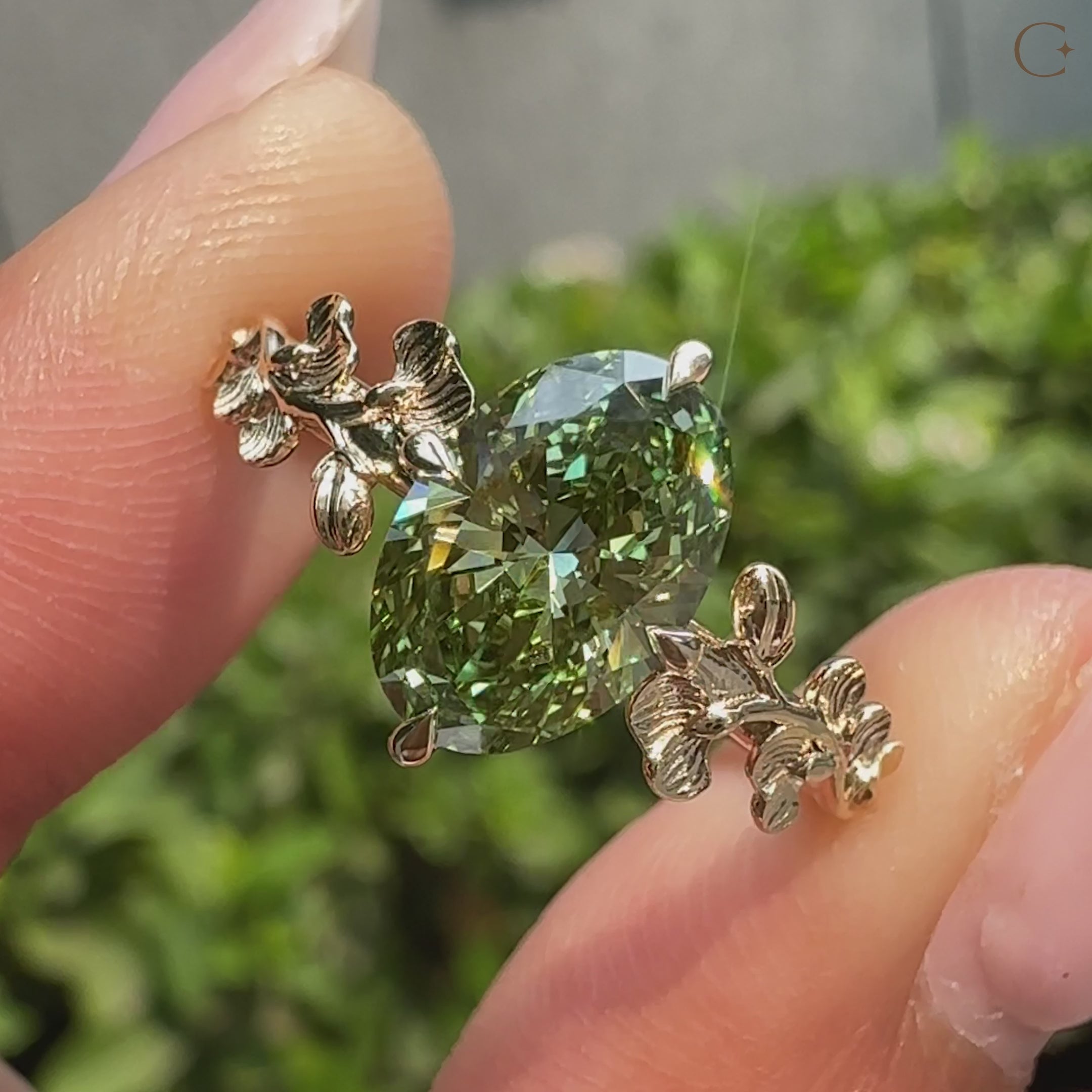 Ginkgo leaf ring with handcrafted botanical band details.
