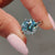 Solitaire engagement ring paired with a twisted band for a fresh look.
