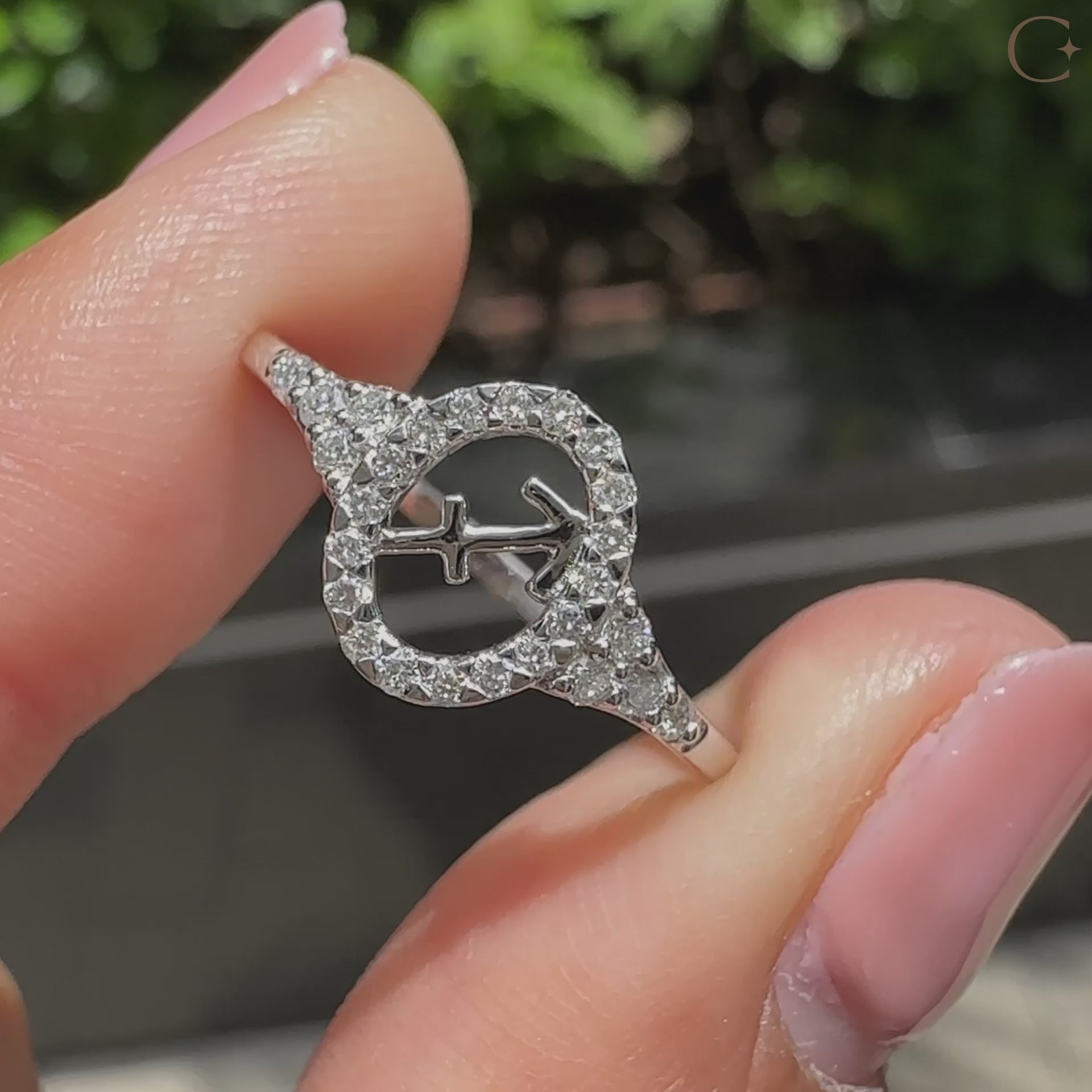 Handmade Sagittarius zodiac engagement ring featuring astrology design and IGI certified diamond.
