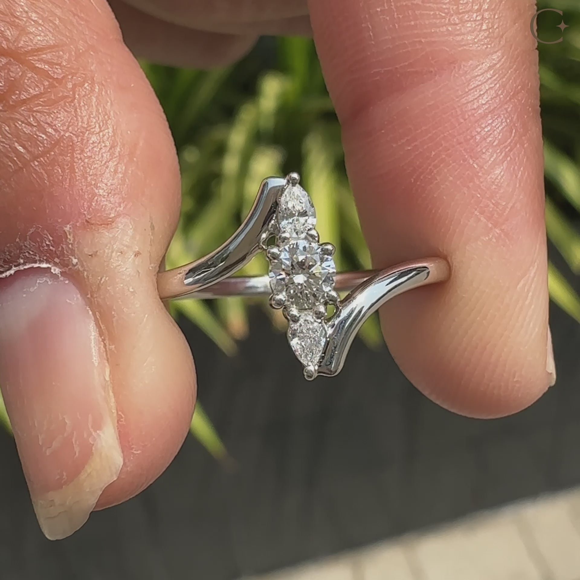 Three stone ring featuring stunning diamonds.
