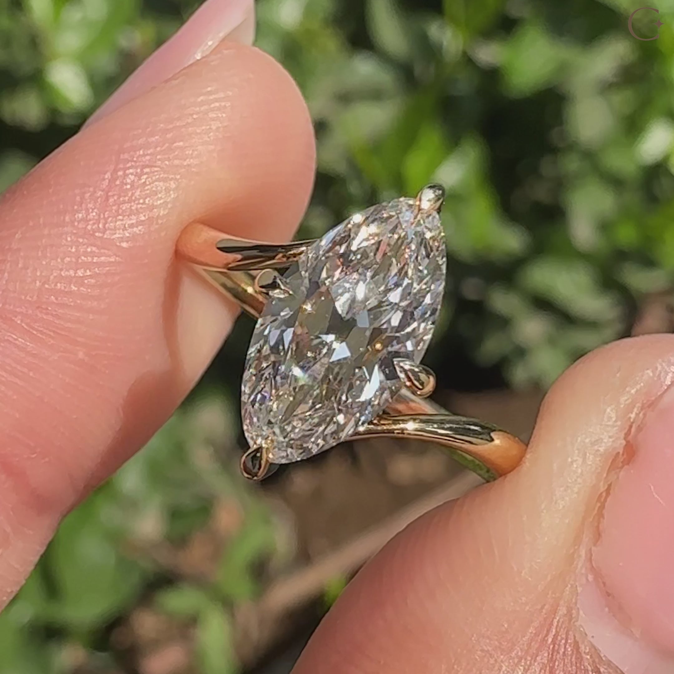 Handmade marquise diamond ring in solitaire bypass setting
