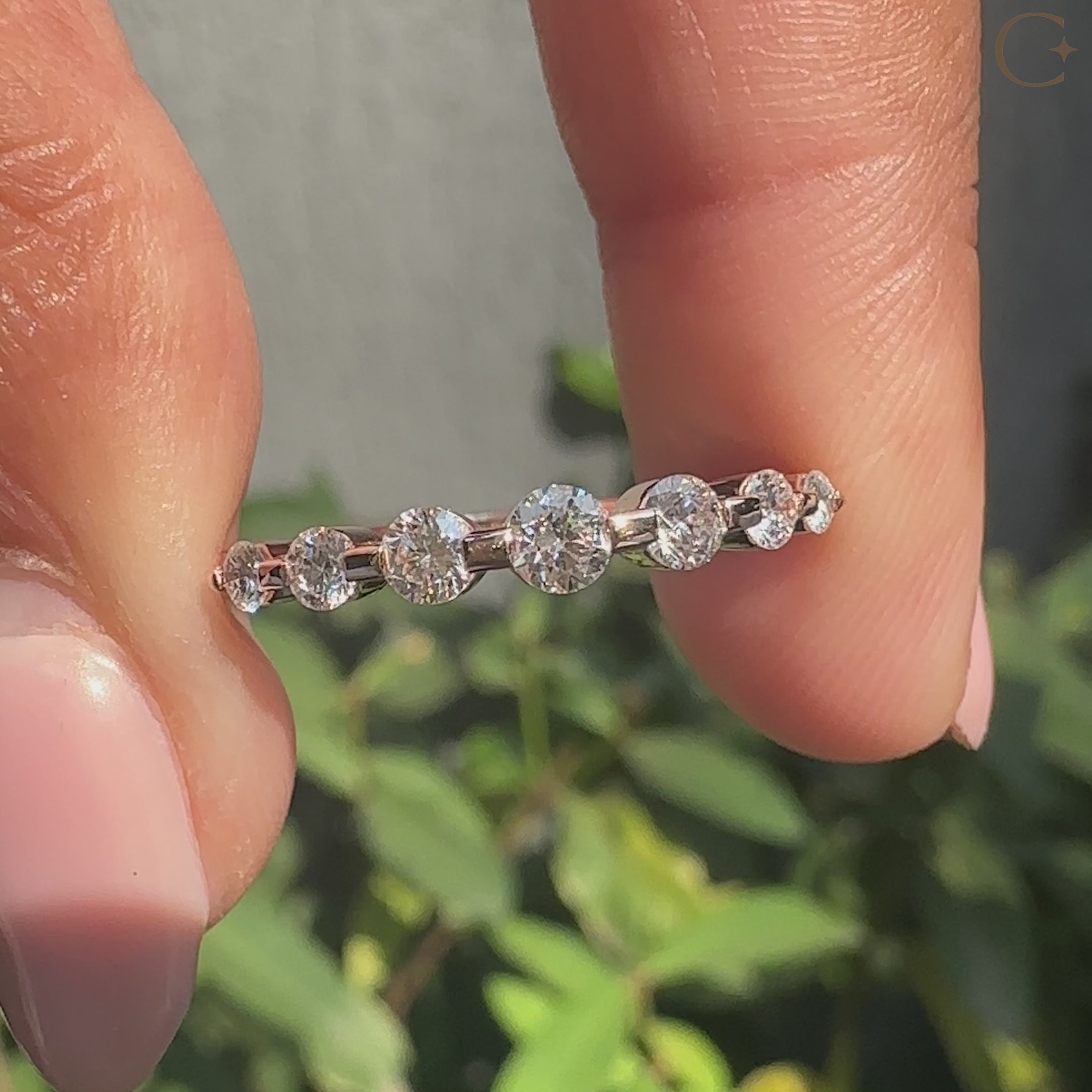 Half eternity diamond band with lab grown round diamonds.
