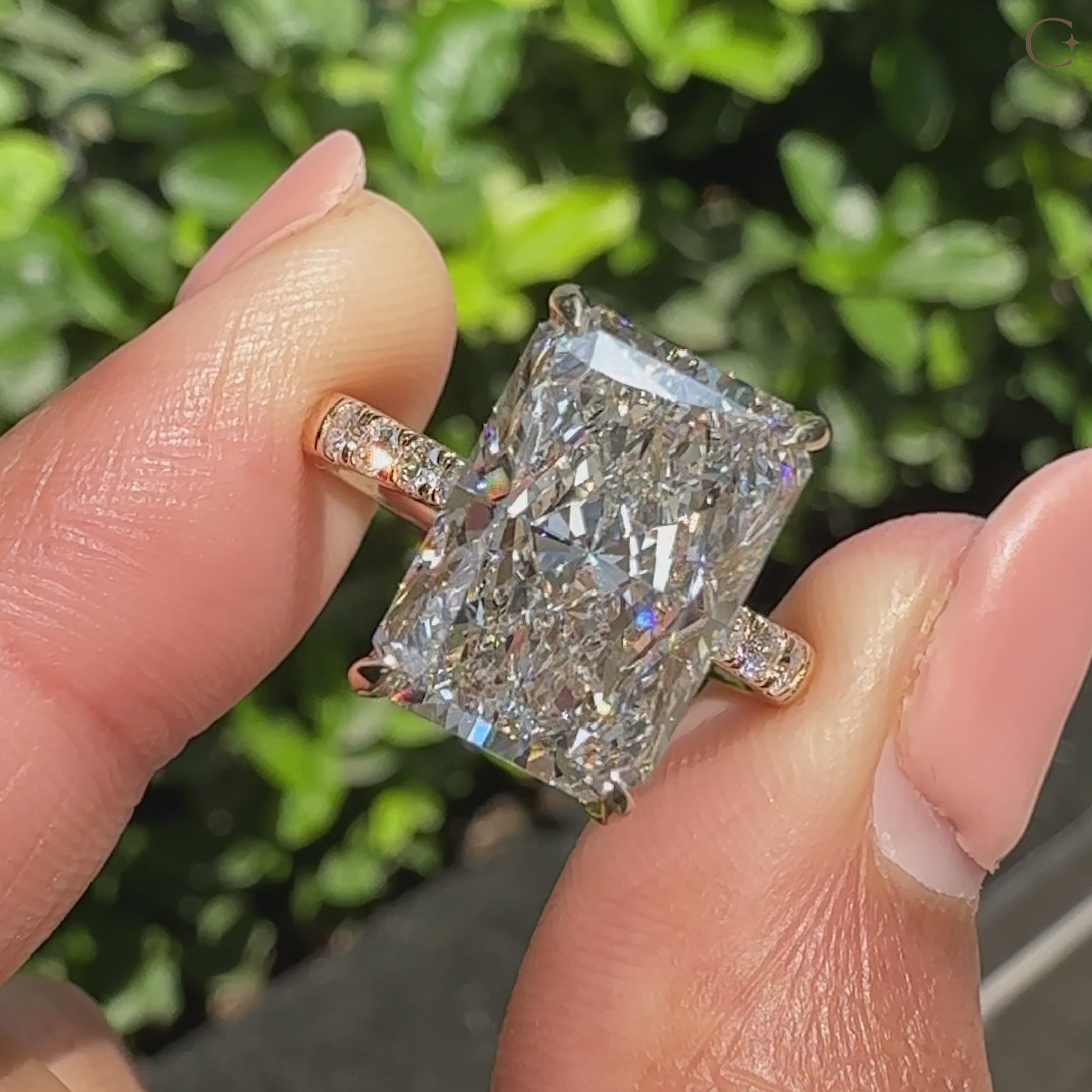 Radiant cut 5 carat diamond ring with pave band
