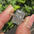 Radiant cut 5 carat diamond ring with pave band
