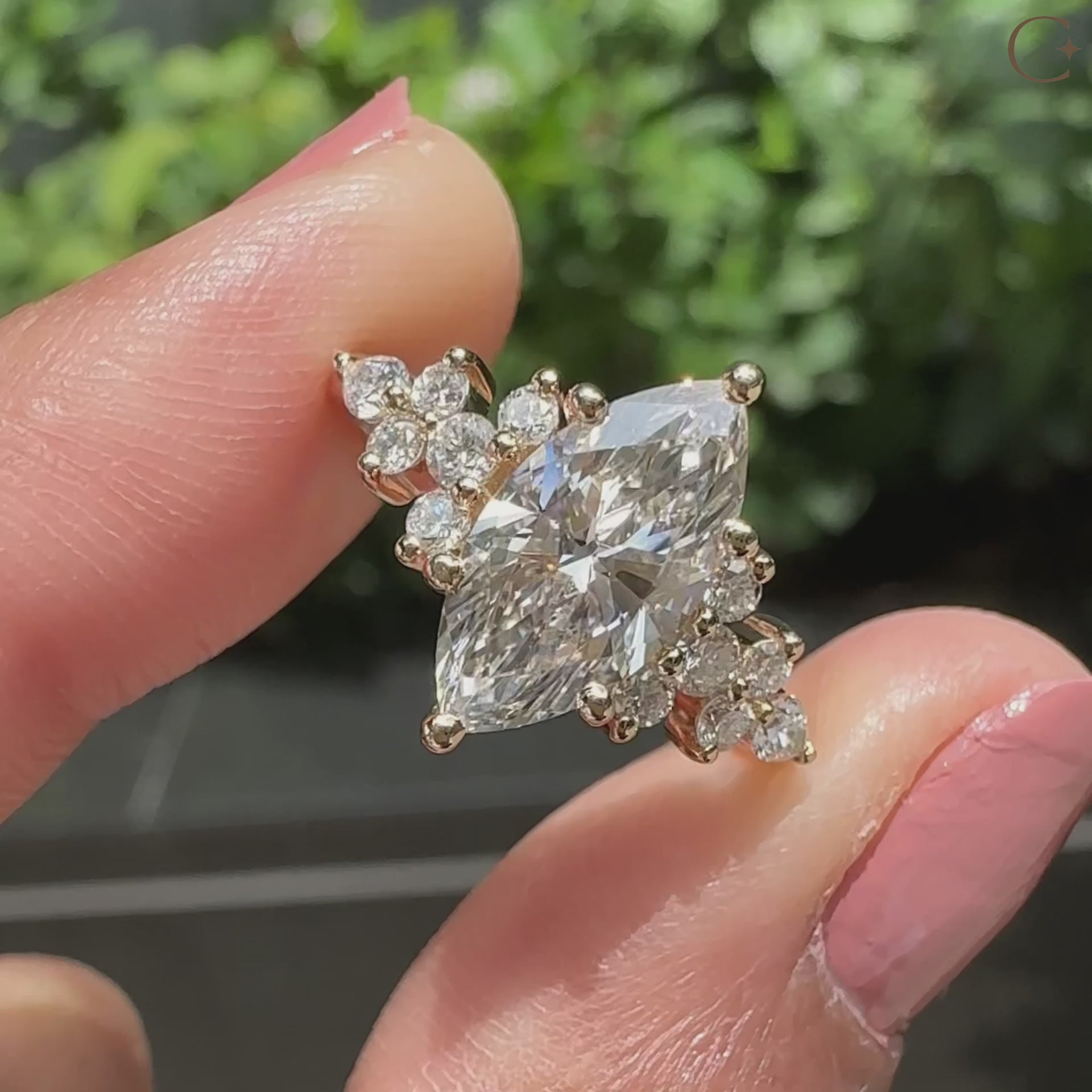 Cluster engagement ring with 6 prong setting.