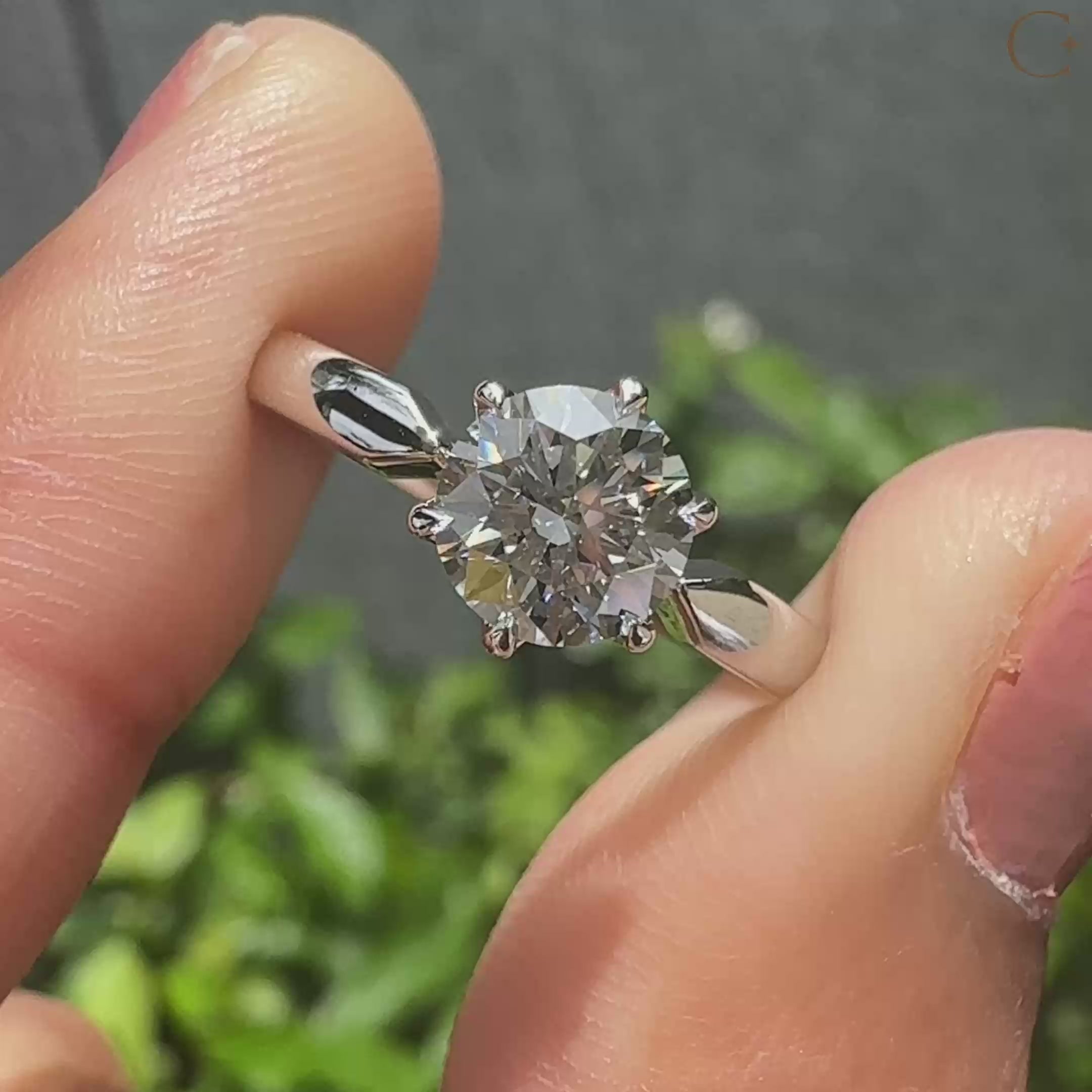 Solitaire diamond ring in tulip setting ring.
