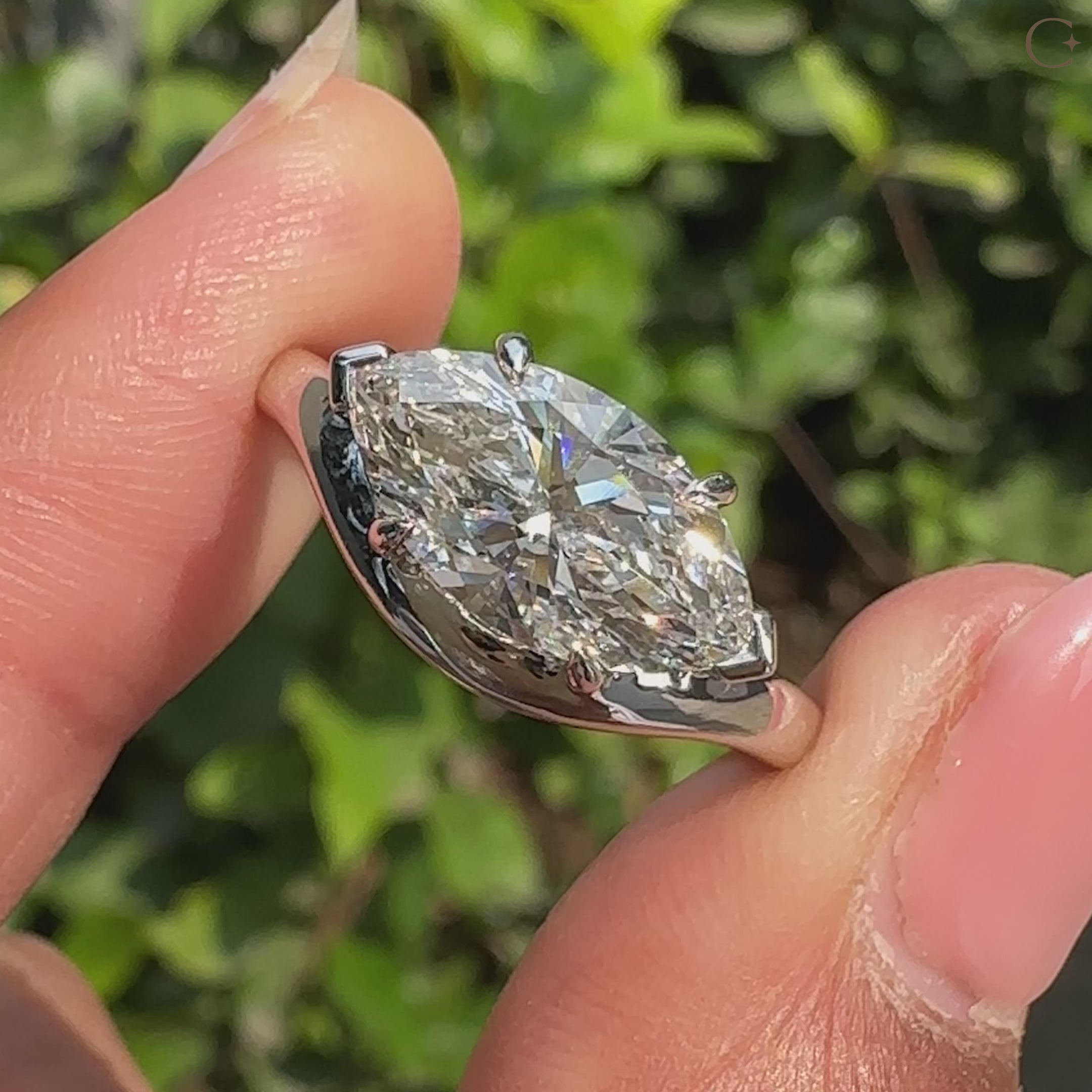 Modern marquise diamond engagement ring in solitaire style
