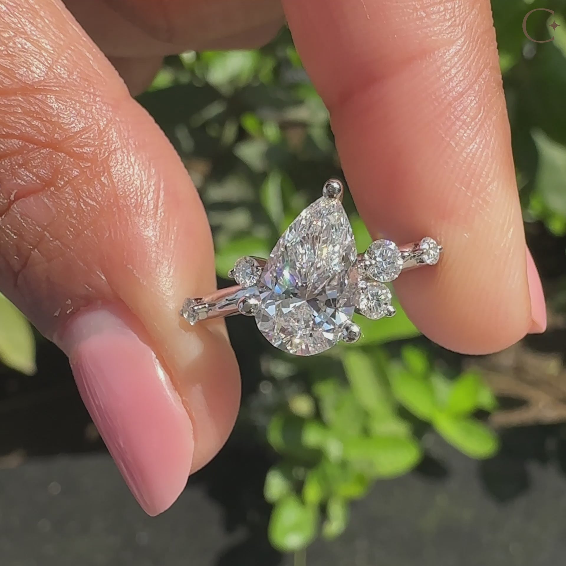 3 prong setting secures the pear diamond with sleek elegance.
