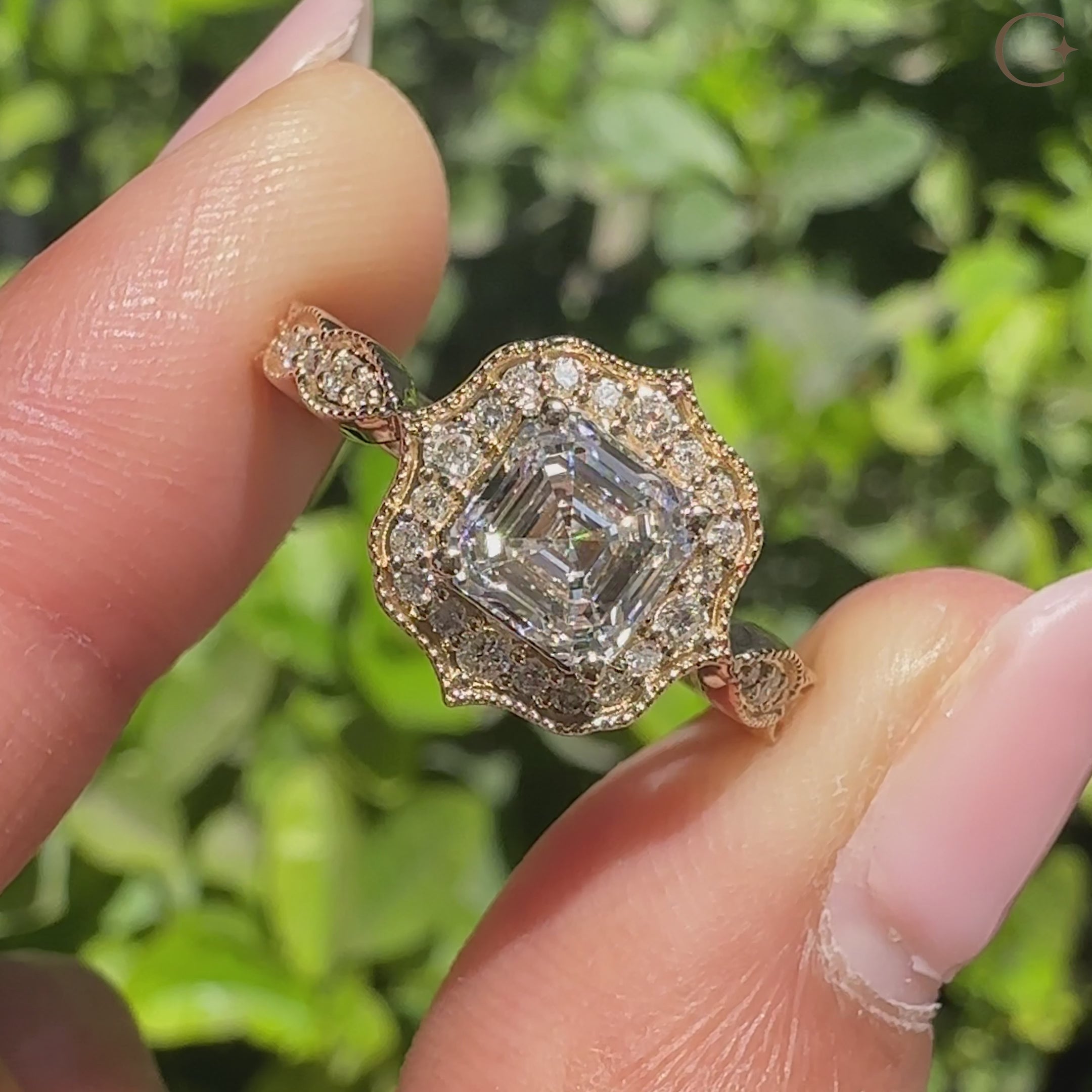 Lab grown Asscher ring with pave band and halo setting.