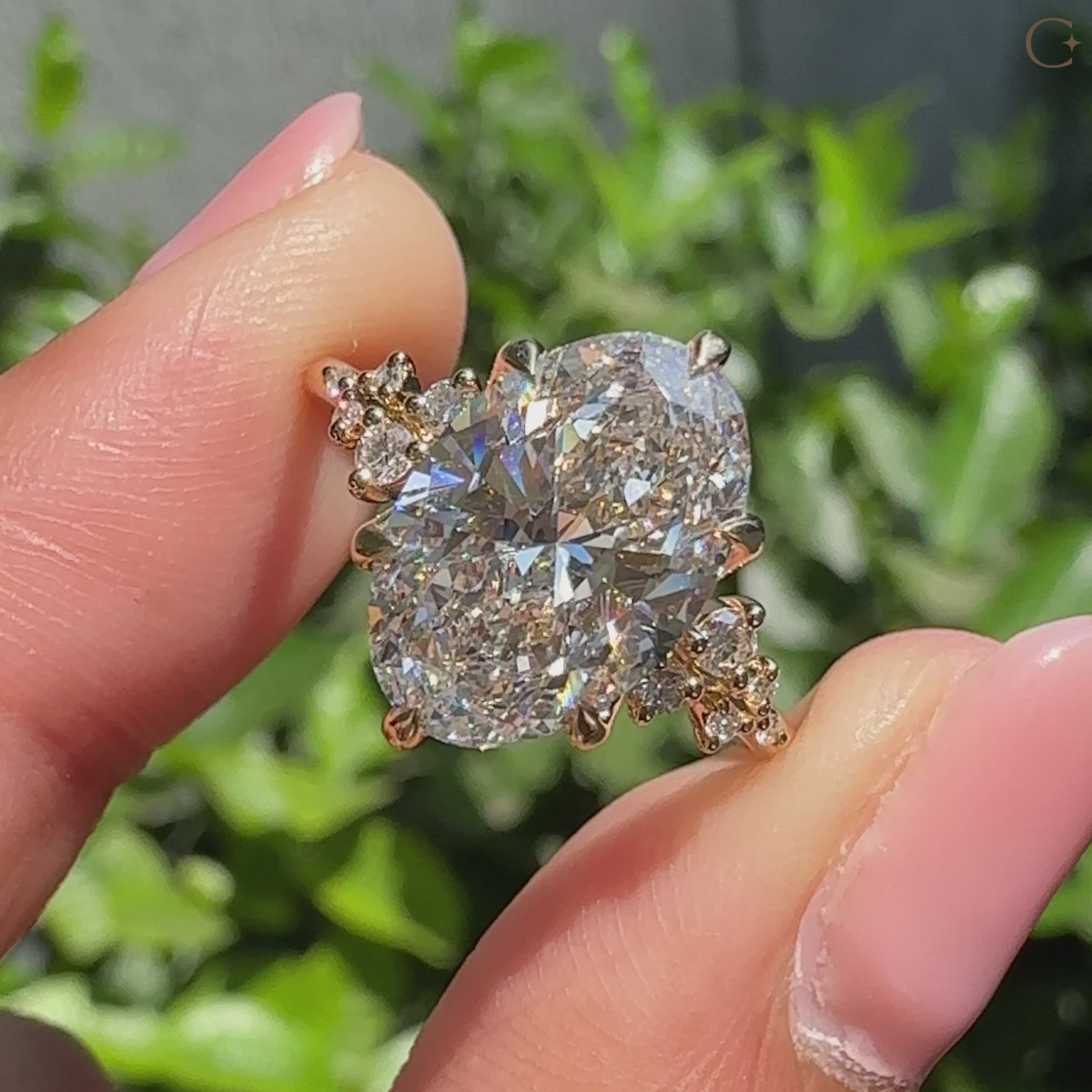 Lab grown oval diamond ring with tulip setting.
