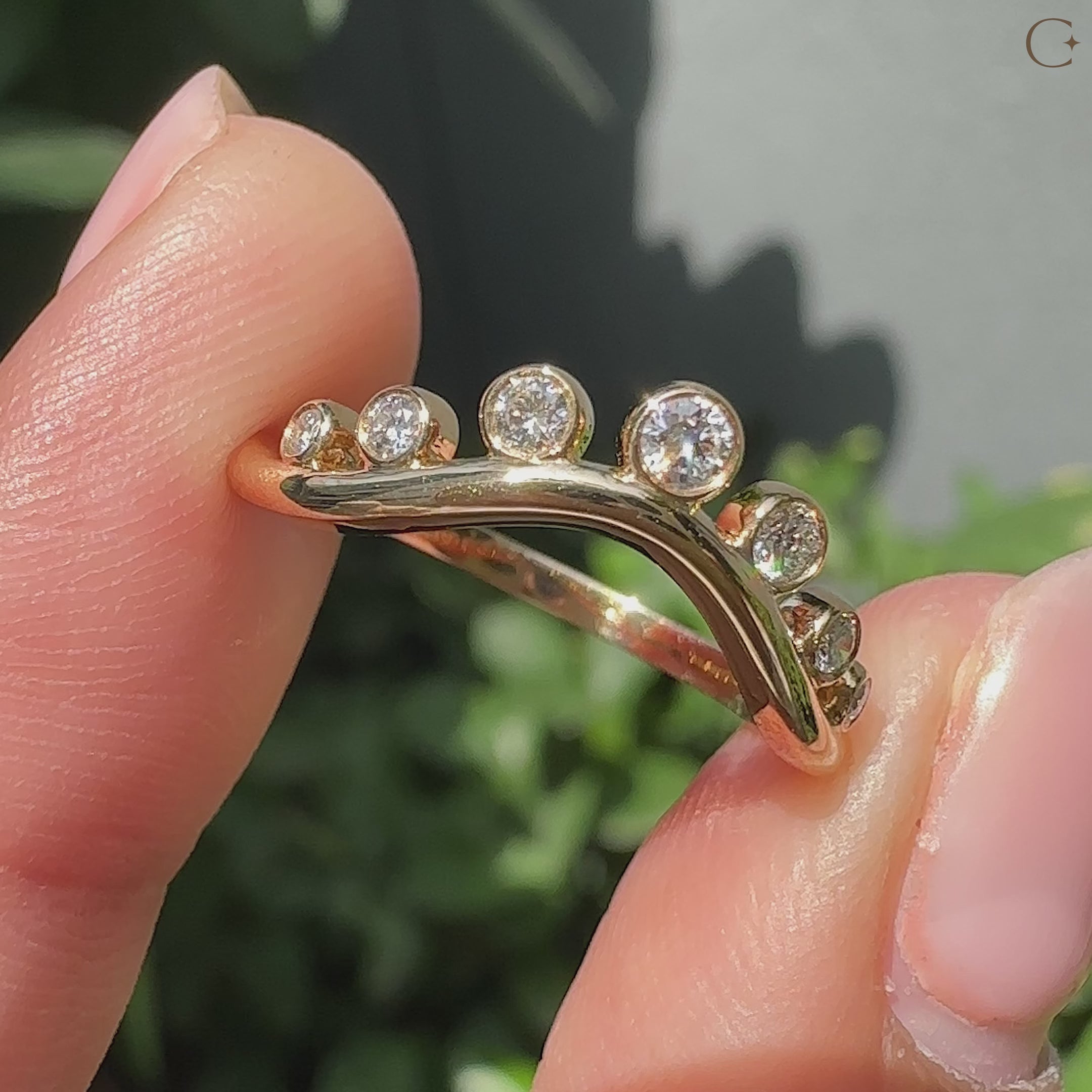 Carat Diamonds gold wedding band.