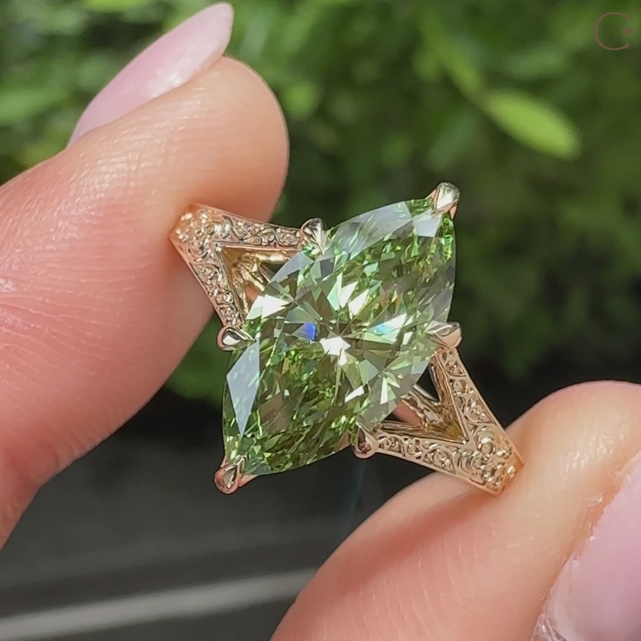 Vintage inspired green marquise diamond solitaire ring