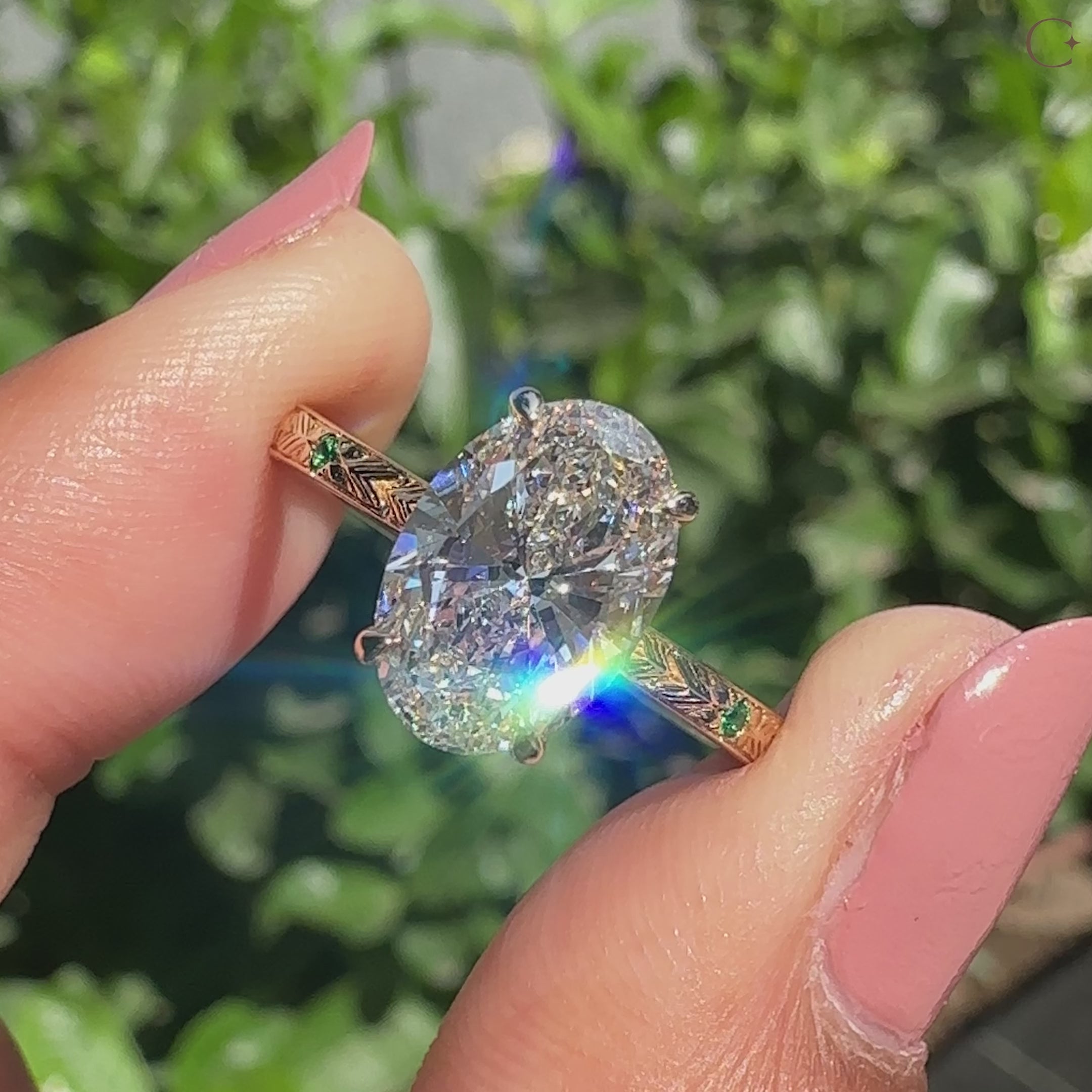 Oval cut diamond ring with hidden halo round diamonds.
