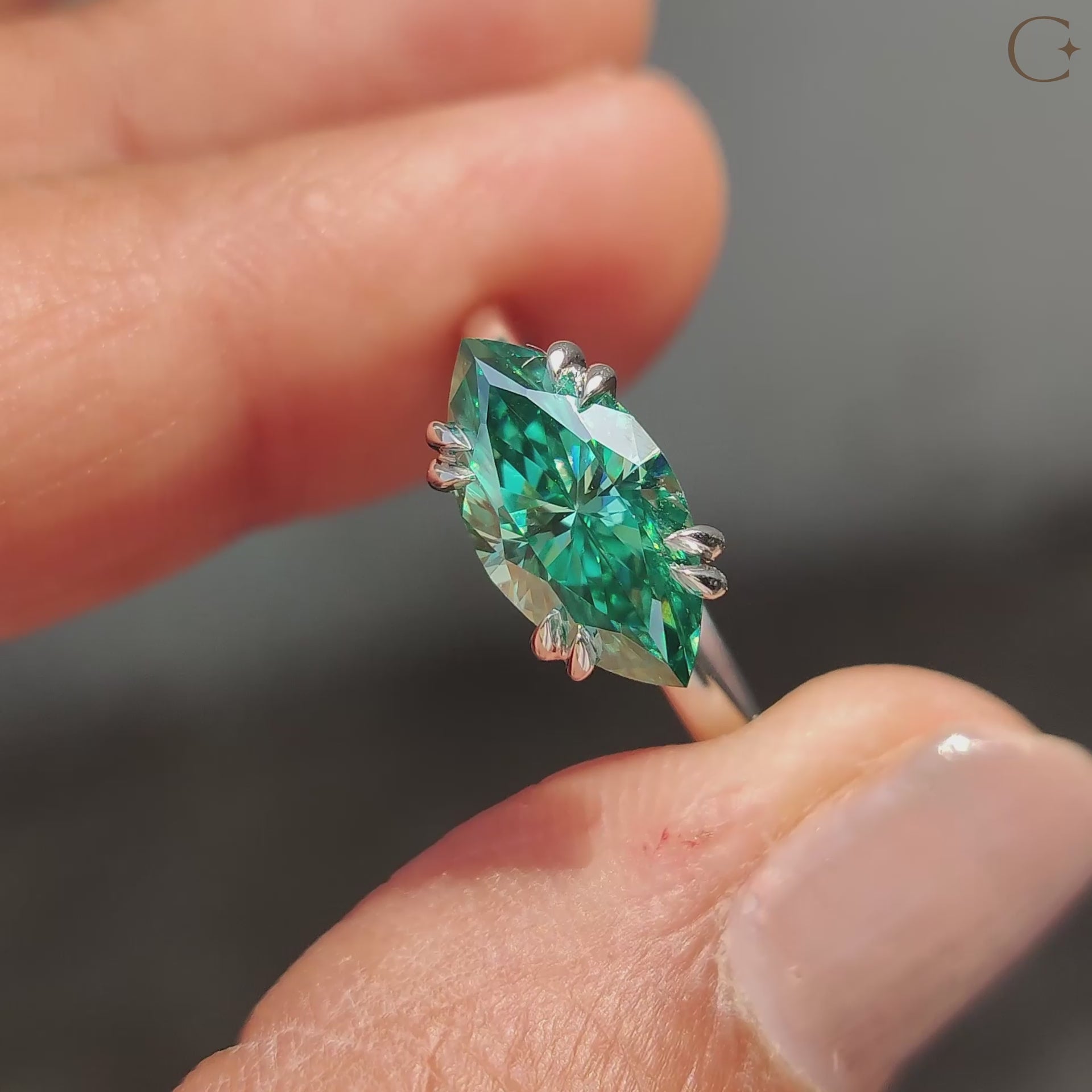 Solitaire engagement ring with east to west marquise cut