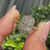 Radiant halo ring with tapered shank and vintage design.
