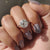 The moissanite halo ring offers radiant brilliance and lasting shine.
