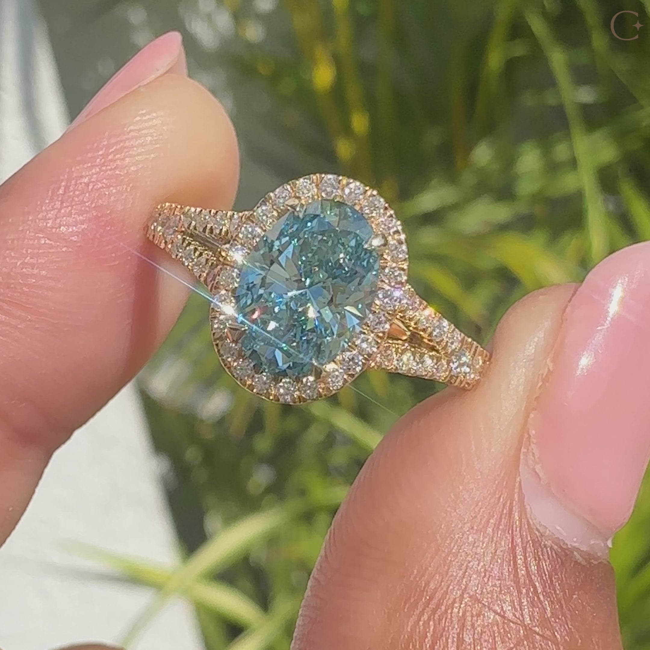 Handmade oval engagement ring with split shank.
