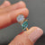 Marquise and round ring blends fine elegance and style.